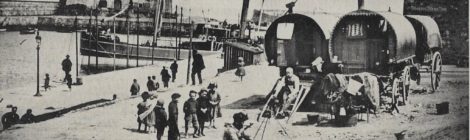 Harbour scene with travellers and steam boat