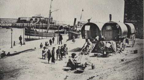 Harbour scene with travellers and steam boat