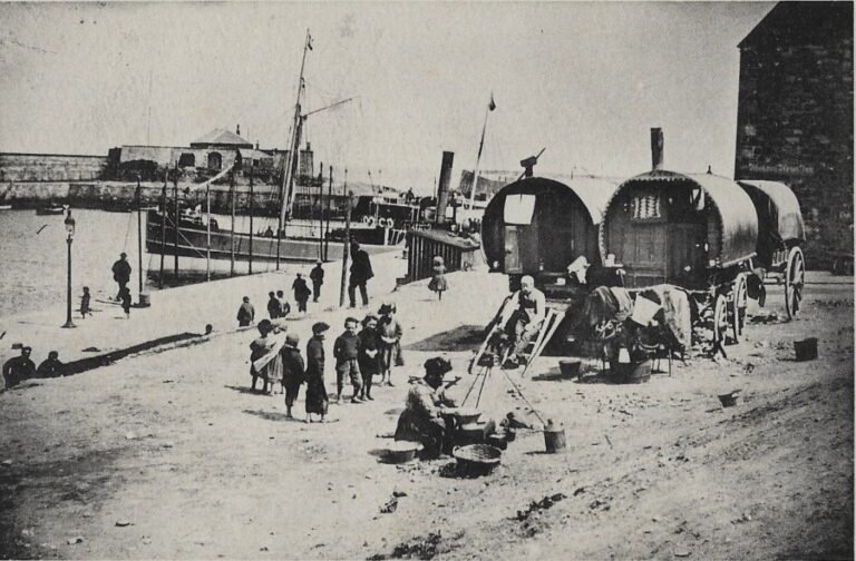 Harbour scene with travellers and steam boat